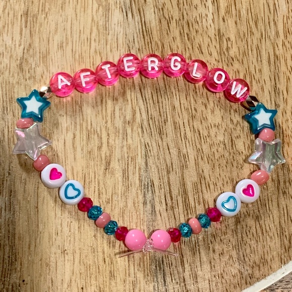 5 for $20 Taylor Swift Handmade Friendship Beaded Bracelet
“Afterglow” - Picture 2 of 2